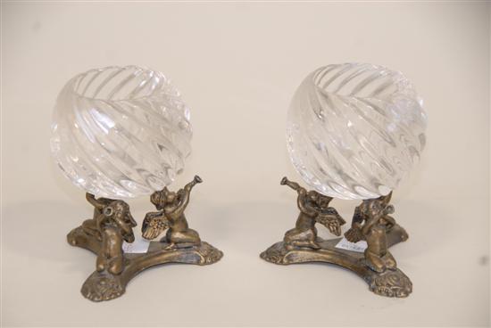 Appraisal: PAIR OF CANDLE HOLDERS Cherub figural in a bronzed patina