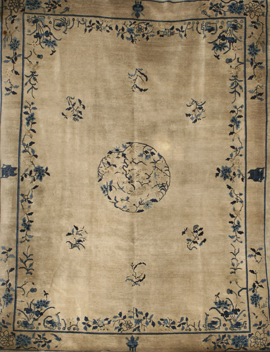 Appraisal: Peking Rug Second Quarter th Century Beige ground with floral