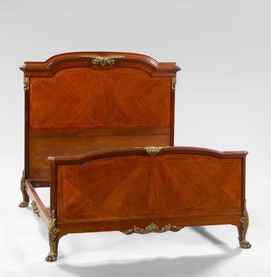 Appraisal: Louis XVI-Style Mahogany Bed early th century the headboard slightly