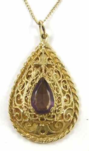 Appraisal: AMETHYST YELLOW GOLD PENDANT NECKLACE suspended on a inch chain