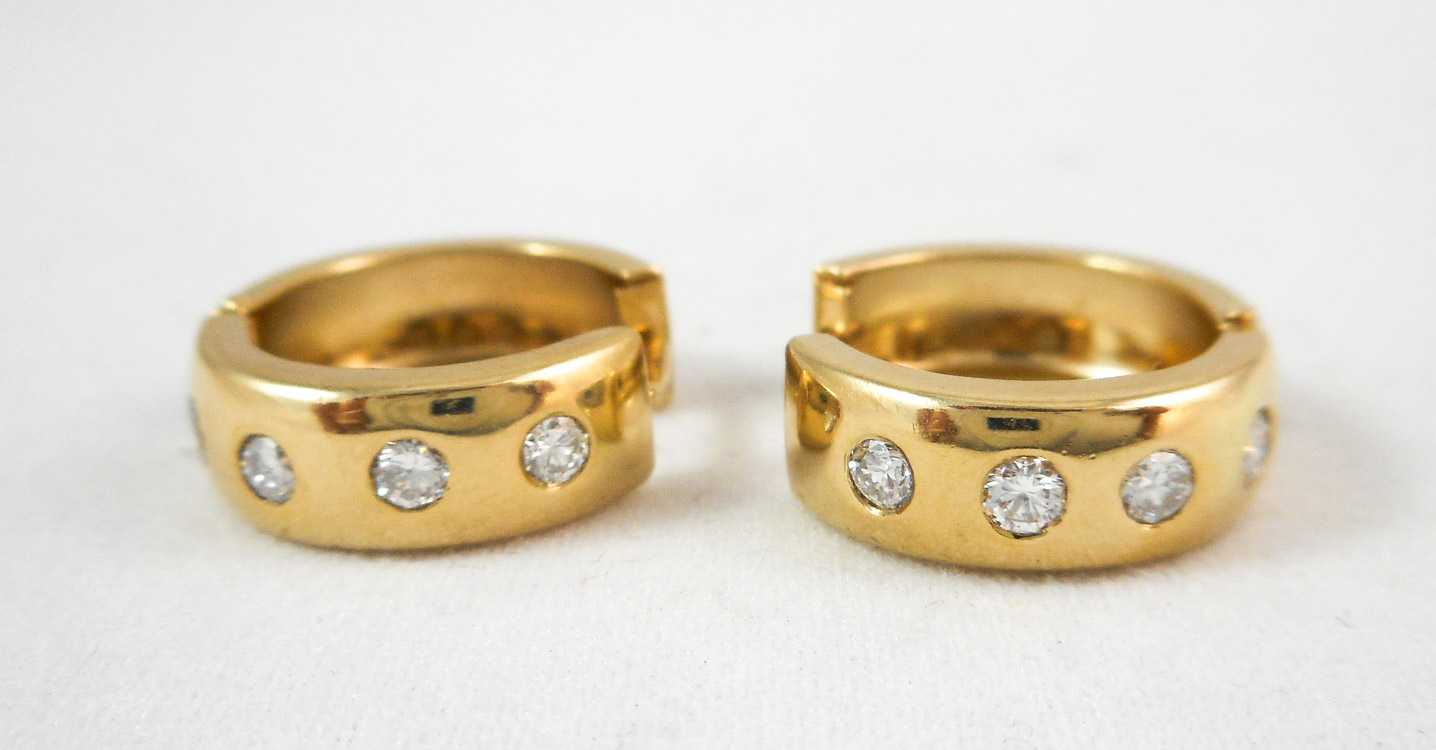 Appraisal: PAIR OF DIAMOND AND YELLOW GOLD HOOP EARRINGS Each k