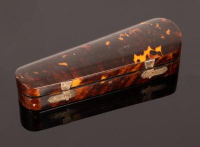 Appraisal: A tortoiseshell and silver mounted needle case in the form