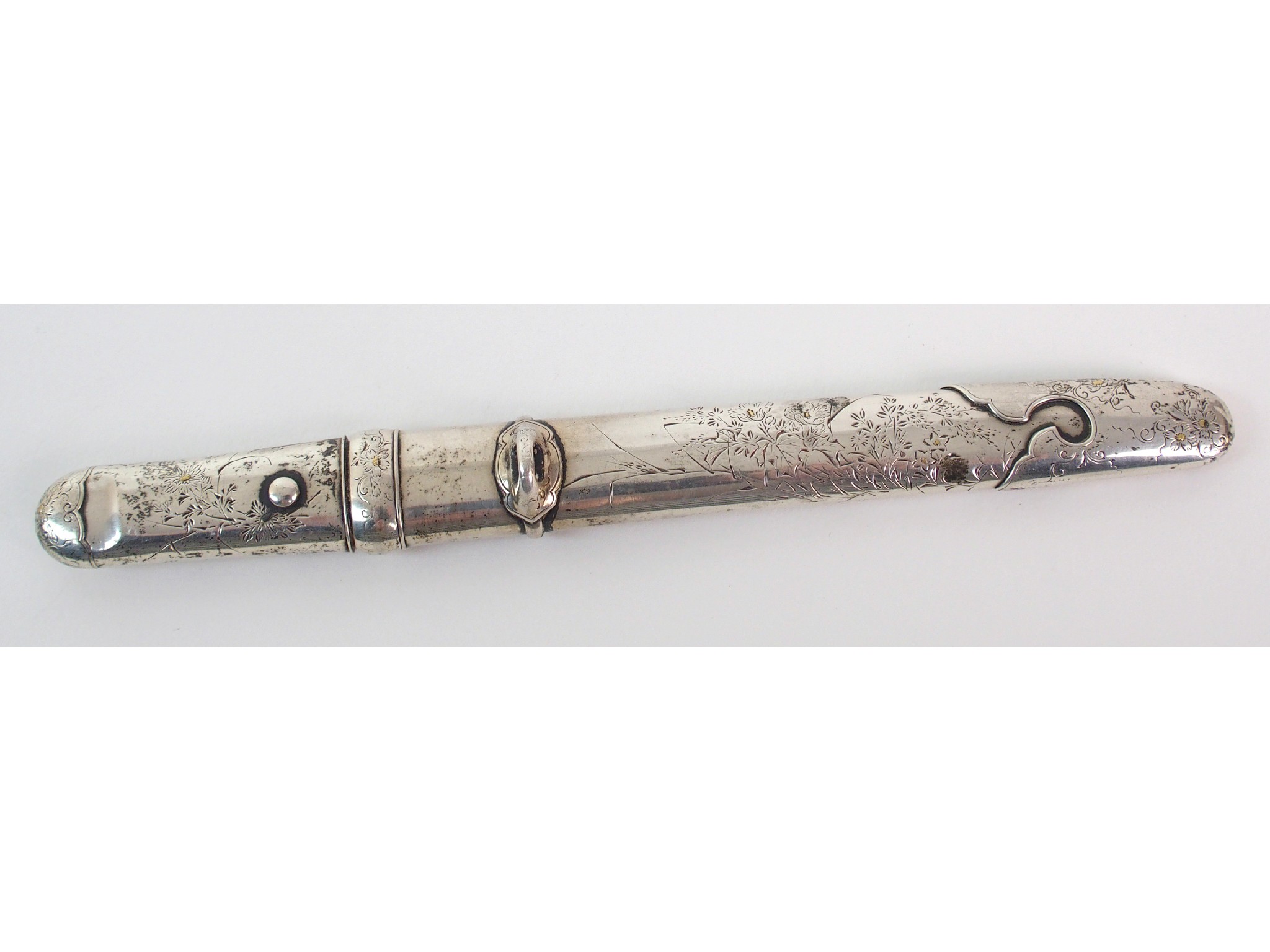 Appraisal: A Japanese silver letter openermodelled as a short sword chased