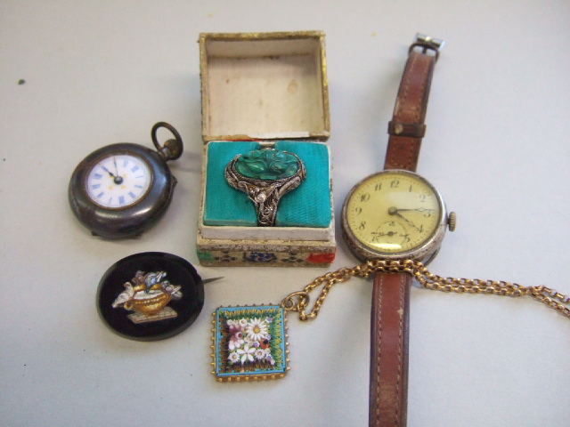 Appraisal: A silver cased wristwatch import mark London a ladies gun