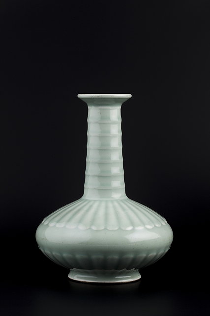 Appraisal: A Chinese pale celadon vaseYongzheng - of depressed bottle form