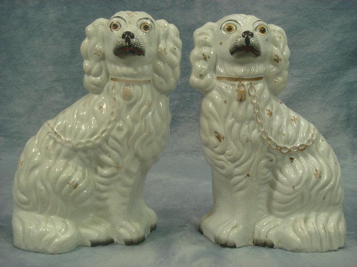 Appraisal: Pr Staffordshire spaniels white with gold trim h Estimate -