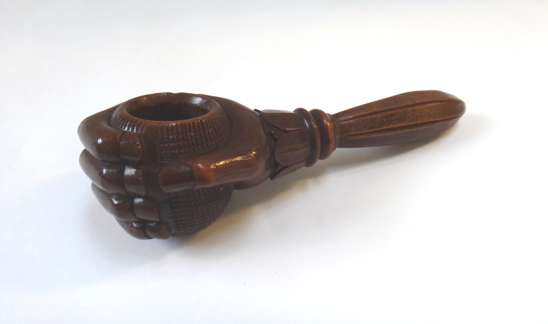 Appraisal: A novelty yew wood nut cracker late th century early