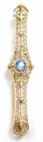 Appraisal: BLUE SPINEL AND SEED PEARL BROOCH k yellow gold with