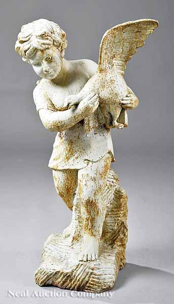 Appraisal: A Cast Iron Garden Figure of a Boy Holding a