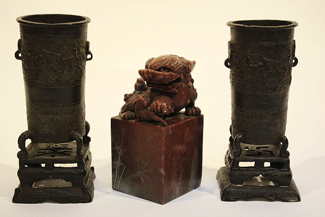 Appraisal: A PAIR OF ANTIQUE CHINESE CAST IRON CYLINDRICAL VASES with