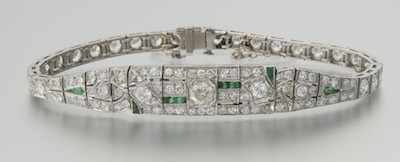 Appraisal: An Art Deco Platinum Diamond and Emerald Bracelet Platinum articulated