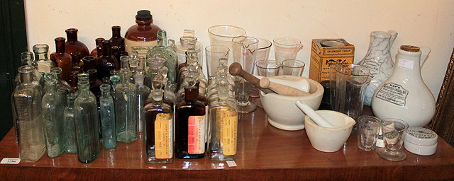 Appraisal: A COLLECTION OF PHARMACY RELATED ITEMS to include two earthenware