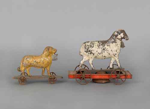 Appraisal: Two painted tin pull toys th c one of a