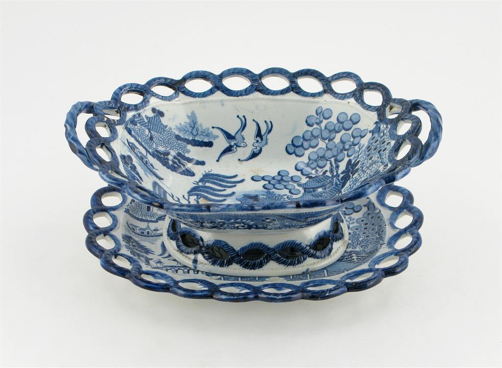 Appraisal: A Staffordshire blue and white fruit basket and stand