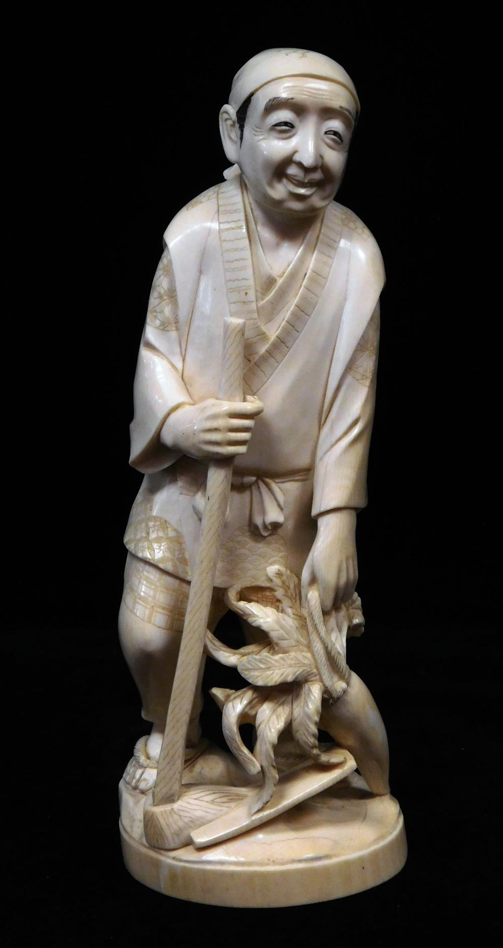 Appraisal: ASIAN Nicely carved ivory figure of farmer with turnip late