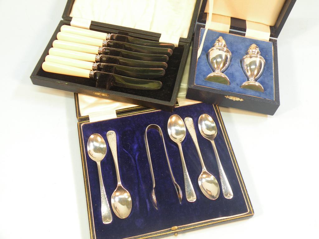 Appraisal: A part set of five silver teaspoons and matching sugar