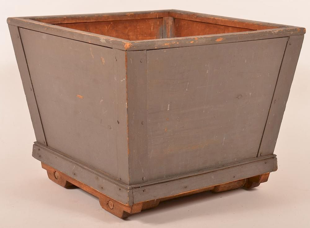 Appraisal: th century gray painted wooden planter with tapered sides th