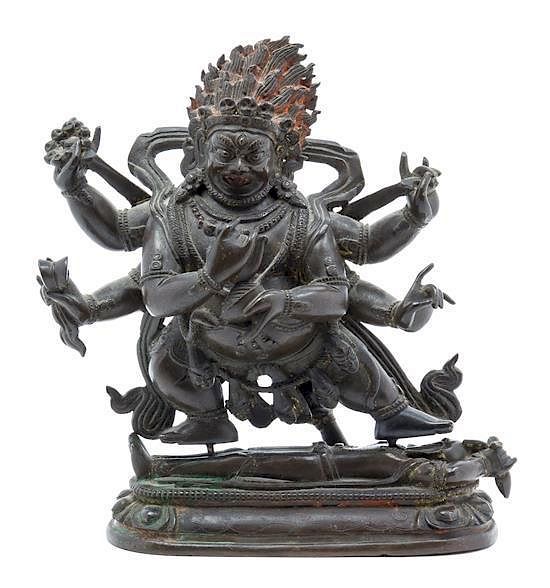 Appraisal: A Sino-Tibetan Bronze Figure of Vajrapani Height x inches A