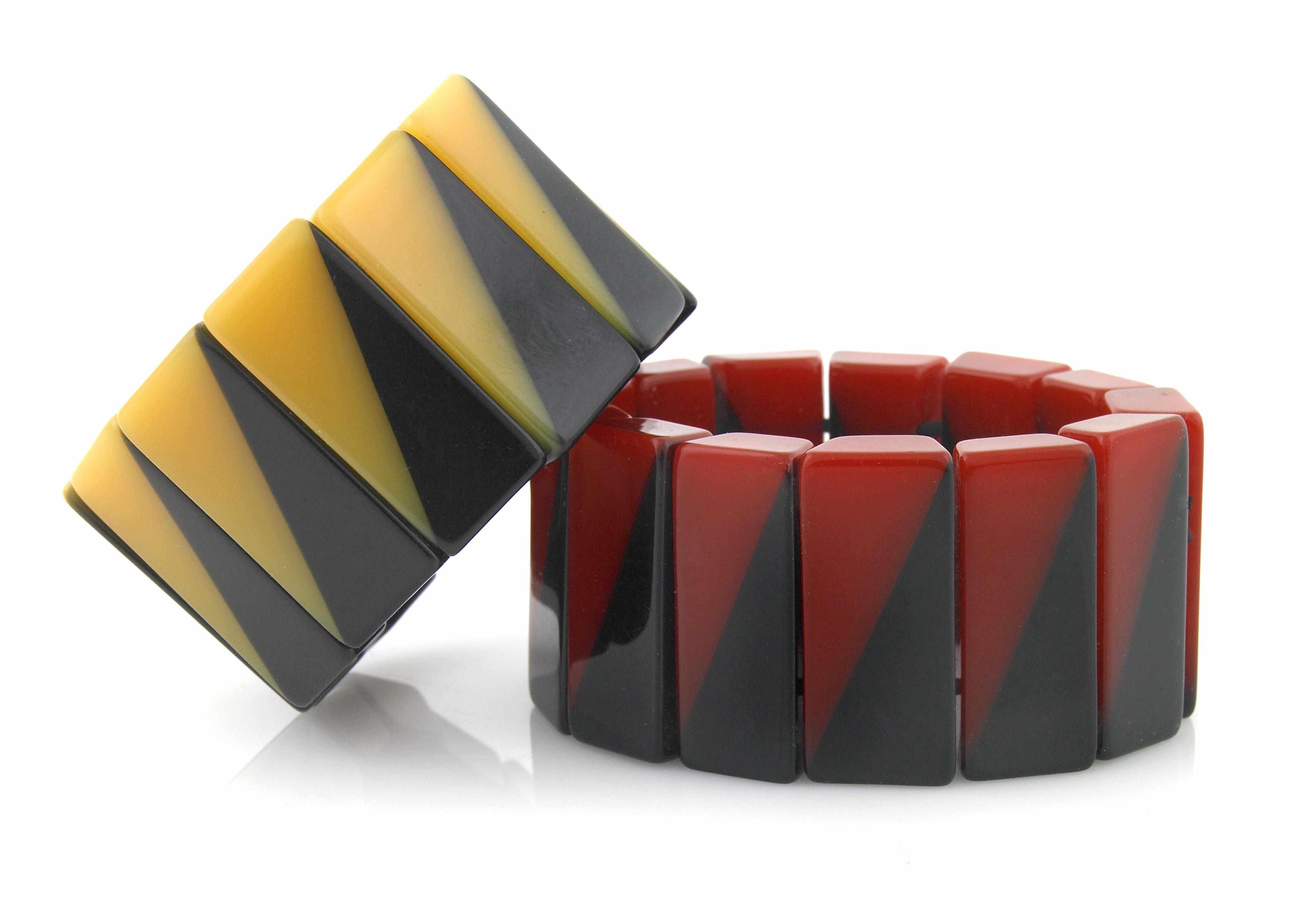 Appraisal: Two Bakelite bracelets stretch with diagonal rectangles each diameter in