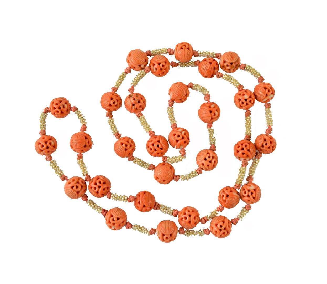 Appraisal: A Chinese single row necklace of carved coral beads each