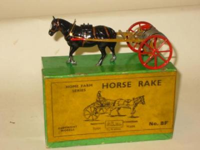 Appraisal: Britains F Hayrake boxed G and Crescent Horse and Cart