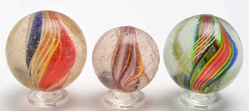 Appraisal: Lot of Swirl Marbles Description The smaller marble is a