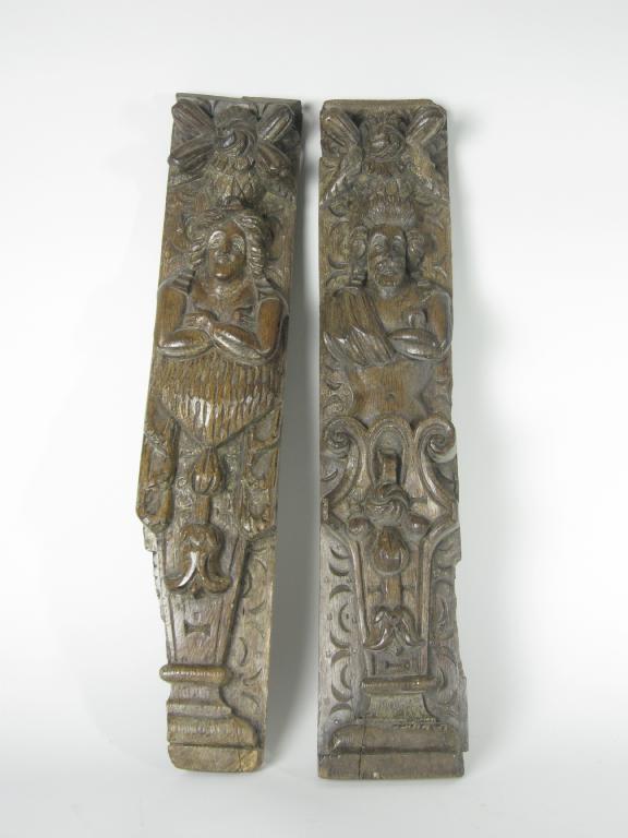 Appraisal: Two th Century carved oak Panels with carved fruit tops