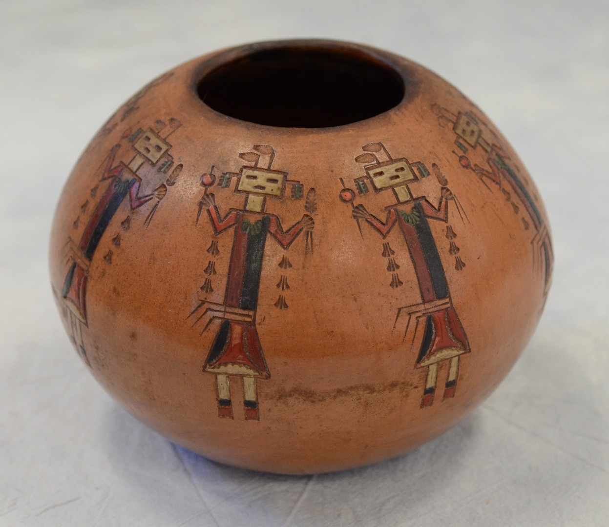 Appraisal: Navajo pottery polychrome incised vase Kachina doll decoration signed KW