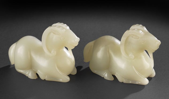 Appraisal: Fine Pair of Chinese Carved White Jade Figures of Goats