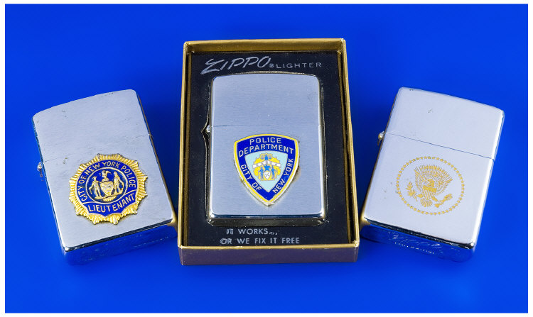 Appraisal: Three Zippo Lighters Comprising No Brush Finish Police Department City