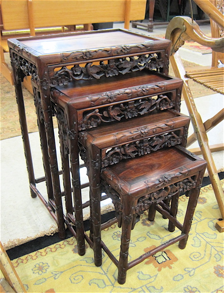 Appraisal: CARVED ROSEWOOD NESTING TABLE SET Chinese export early th century