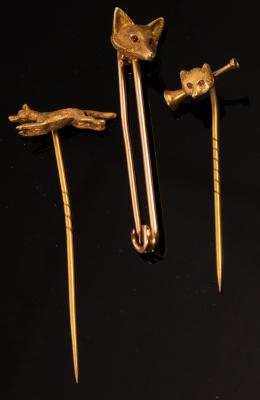 Appraisal: Three stick pins of hunting interest one with fox mask