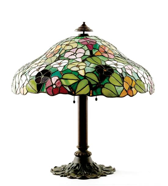 Appraisal: American stained glass shaded bronze table lamp circa domed and