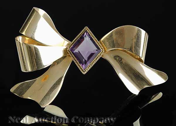 Appraisal: A Retro Yellow Gold and Amethyst Bow Brooch width in