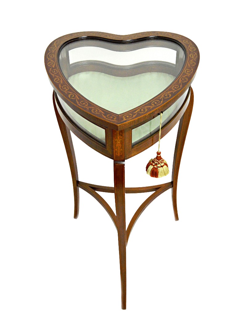 Appraisal: An Edwardian marquetry inlaid mahogany bijouterie table the heart shaped