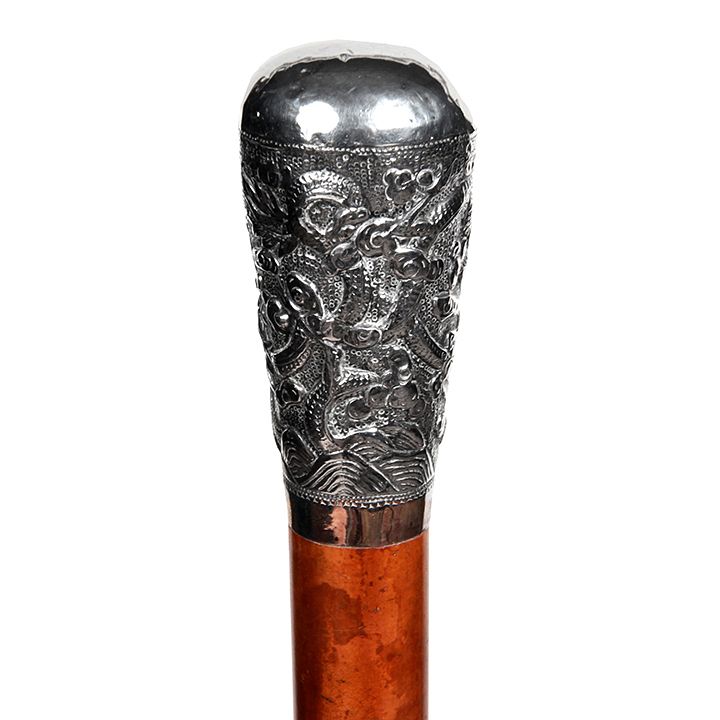 Appraisal: Silver Dress Cane Ca - A high relief silver handle