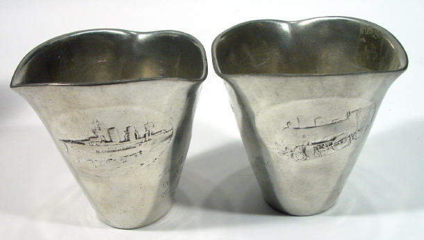 Appraisal: Pair of Kayserzinn Art Nouveau pewter beakers moulded with panels