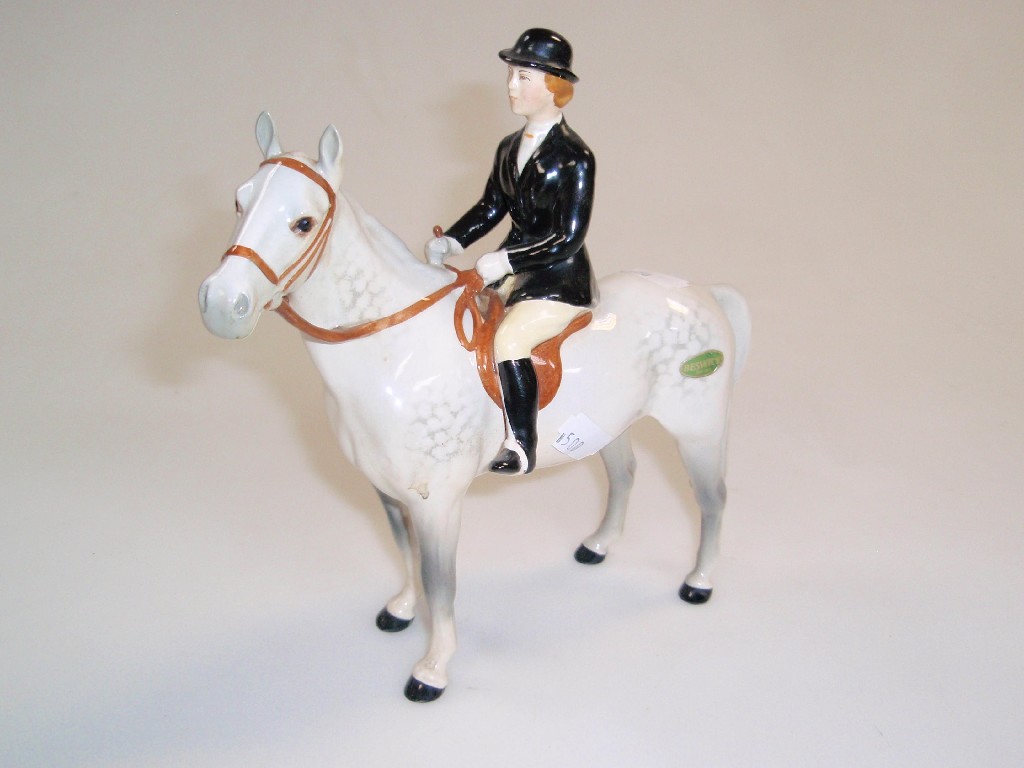 Appraisal: A Beswick figure of a rider and horse stood still