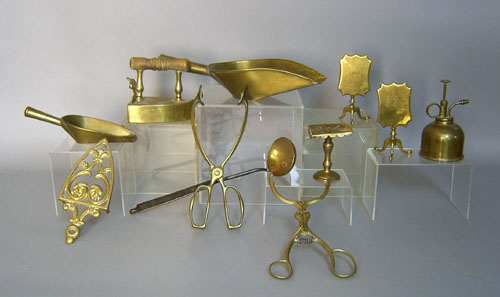 Appraisal: Group of brass to include tongs scoops iron etc