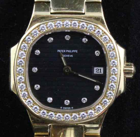 Appraisal: A lady's 's ct gold and diamond set Patek Philippe