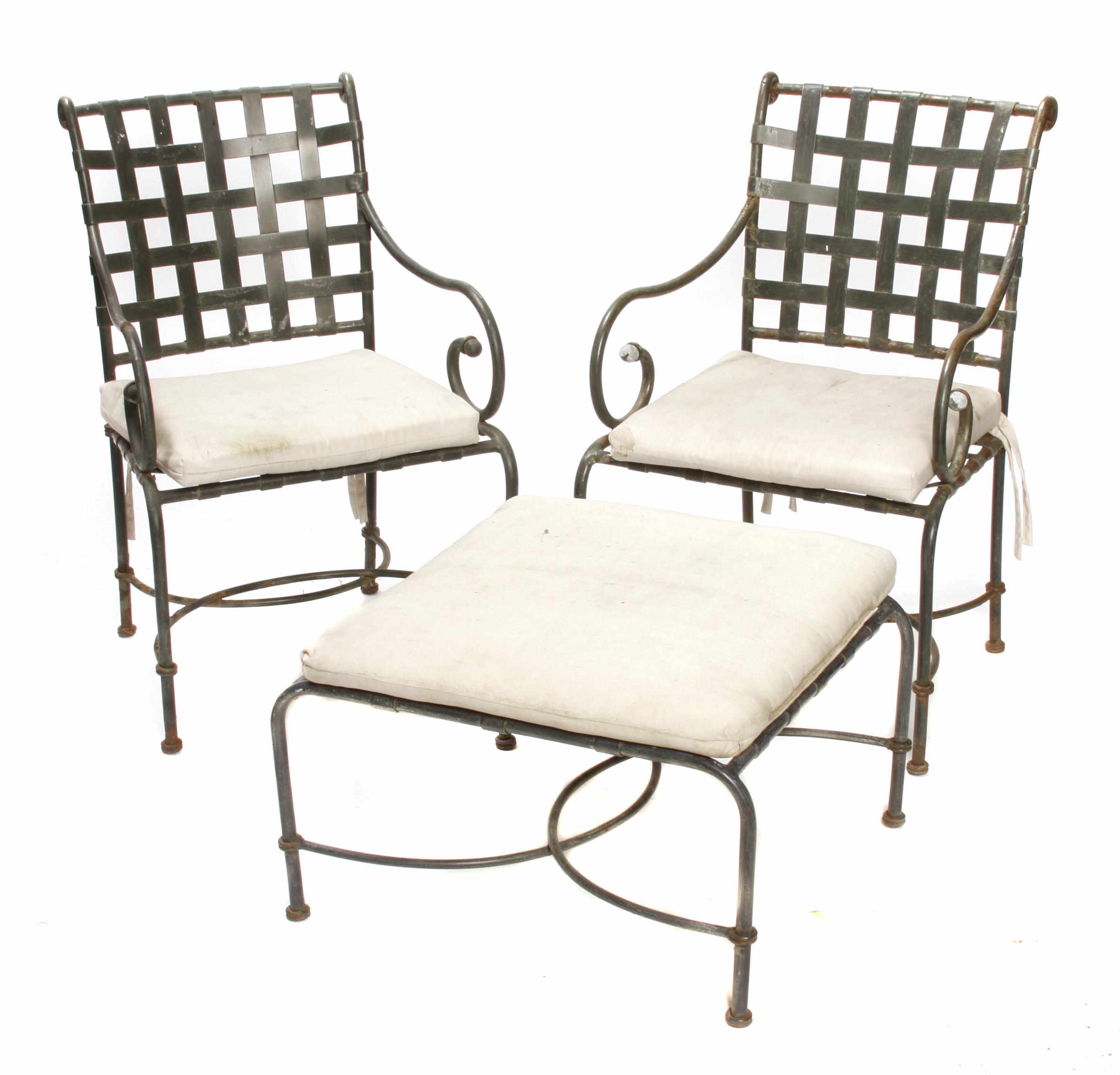 Appraisal: A large suite of patinated metal garden furniture Comprising a