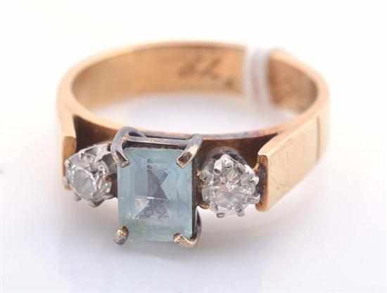 Appraisal: AN AQUAMARINE AND DIAMOND THREE STONE RING