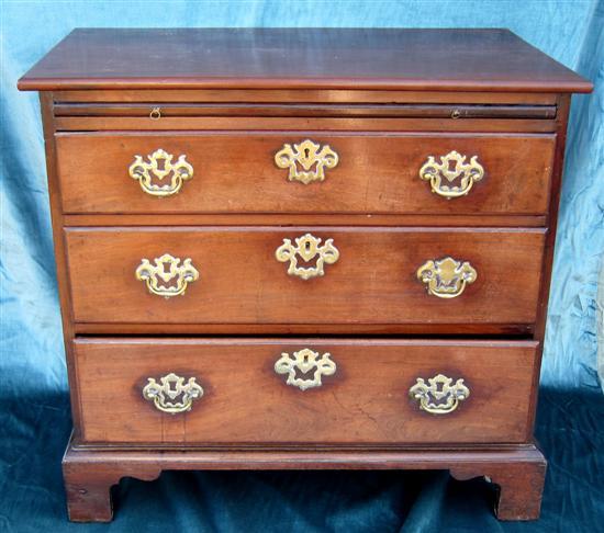 Appraisal: George III mahogany chest with brushing slide above three drawers