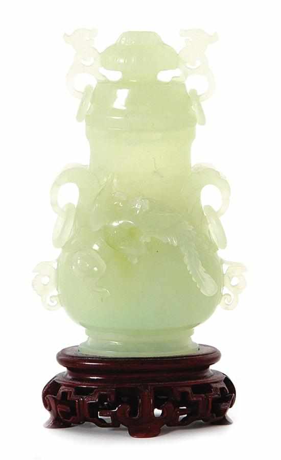 Appraisal: Japanese carved jade covered urn th th century pale green