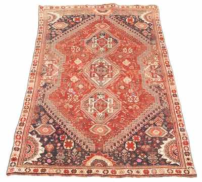 Appraisal: Shiraz Carpet Three geometric medallions down the center brick red