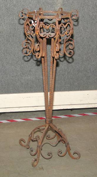 Appraisal: A Rococo style wrought iron plant stand mid th century