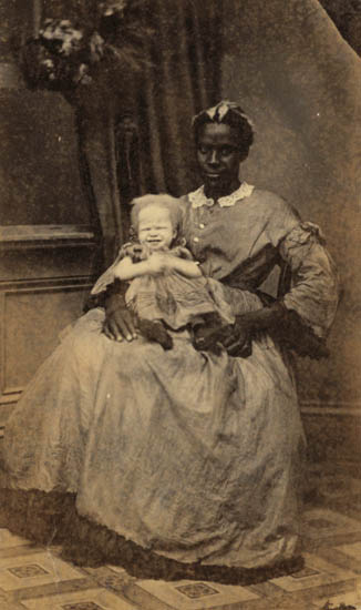 Appraisal: AFRICAN-AMERICANA Extraordinary carte-de-visite portrait of an African-American nanny holding an