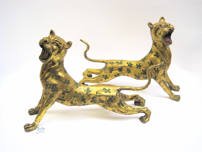 Appraisal: PAIR OF GILT SPELTER LIONS green spotted accents Dimensions L