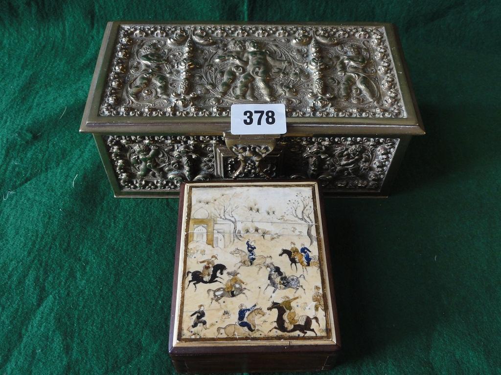 Appraisal: A heavily engraved brass trinket box of classical cherubs to