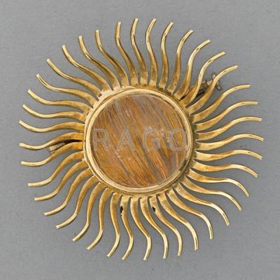 Appraisal: RUTILATED QUARTZ K GOLD SUNBURST BROOCH th C k yg